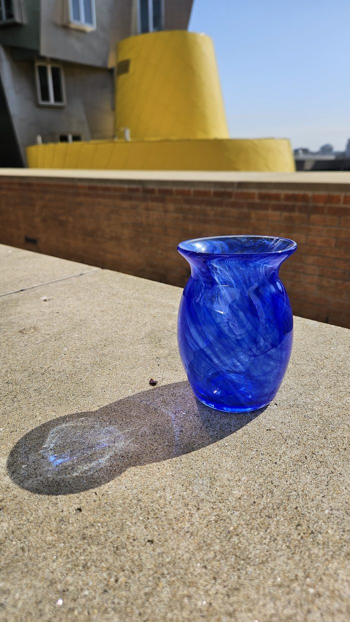 Swirled blue glass vase